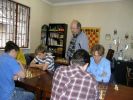 Viktor Zheliandinov is watching blitz by new generation of Lviv players