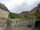 The monastery of Geghard is a unique architectural construction, being partially carved out of the adjacent mountain, surrounded by cliffs. Monastery complex was founded in the 4th century by Gregory the Illuminator at the site of a sacred spring inside a cave.