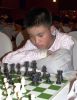 Этот юный шахматист из Монголии остался без награды. Но, на мой взгляд, ему вполне можно вручить приз как самому мужественному участнику турнира. Кто не согласен, тот пусть самостоятельно попробует играть в шахматы с двумя переломанными руками.