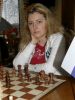 Елена Чередниченко привезла на турнир своих учеников и показывает как надо сражаться на своем примере